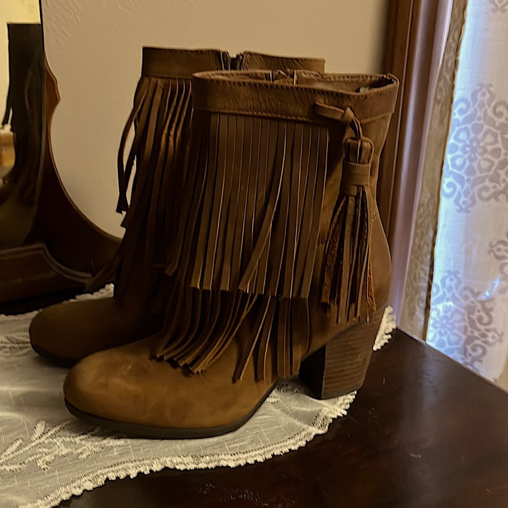 Like new, suede booties with 2 1/2 inch heel.